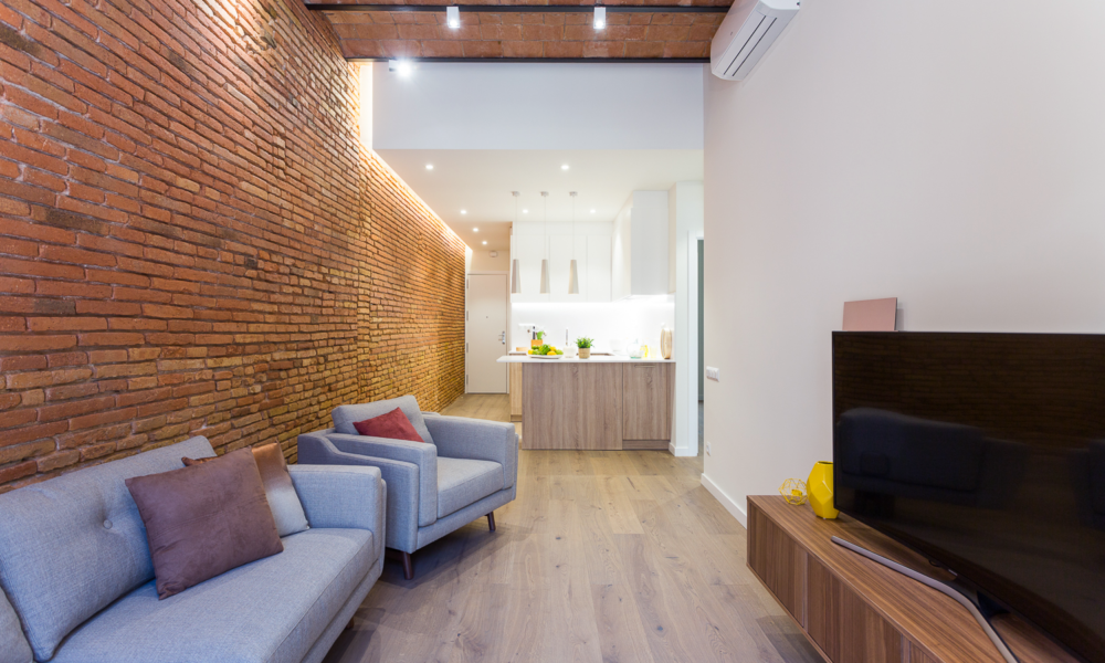 salon comedor. Comedor teniendo de fondo una cocina abierta americana.